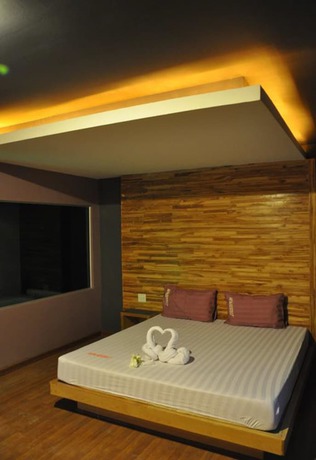 Imagen de la habitación del Hotel In and Out, Nakhon Pathom. Foto 6