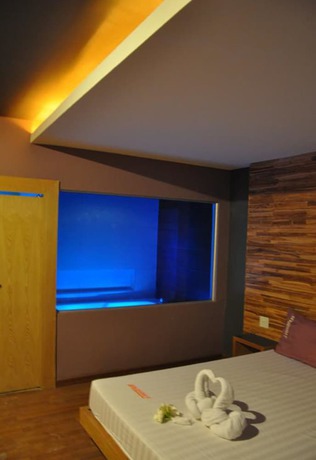 Imagen de la habitación del Hotel In and Out, Nakhon Pathom. Foto 7