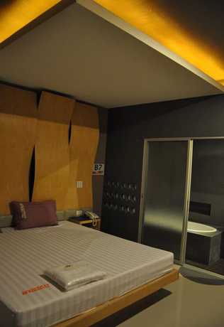 Imagen de la habitación del Hotel In and Out, Nakhon Pathom. Foto 8