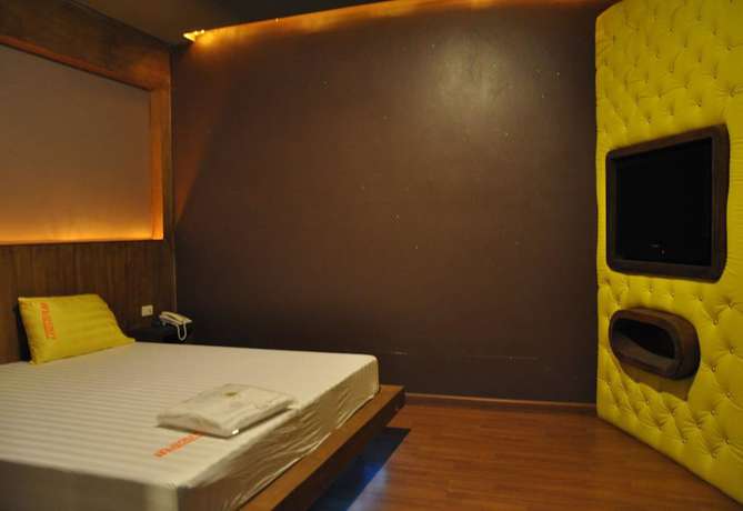 Imagen de la habitación del Hotel In and Out, Nakhon Pathom. Foto 11