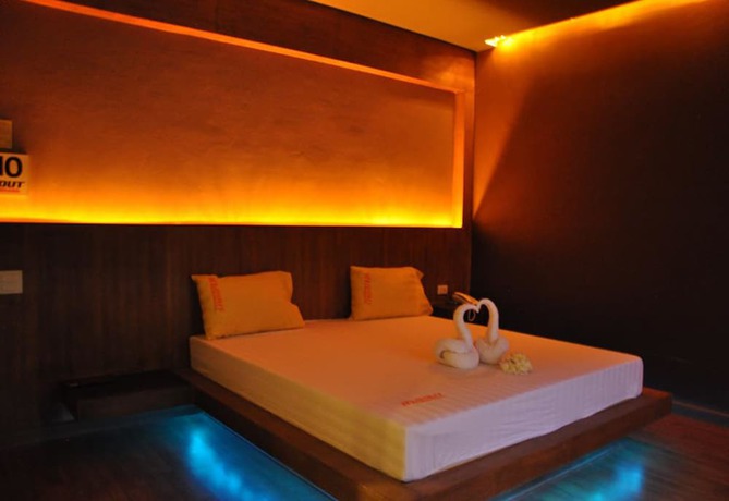 Imagen de la habitación del Hotel In and Out, Nakhon Pathom. Foto 13