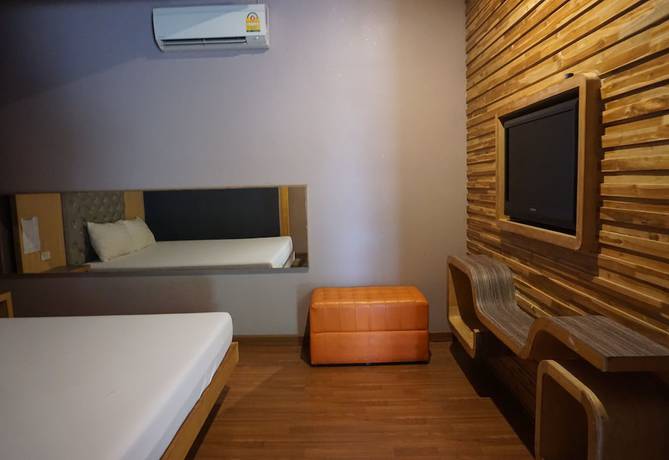 Imagen de la habitación del Hotel In and Out, Nakhon Pathom. Foto 15
