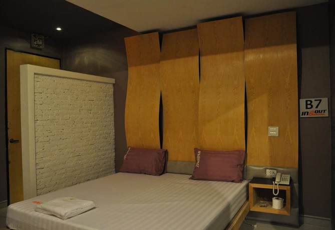 Imagen de la habitación del Hotel In and Out, Nakhon Pathom. Foto 17