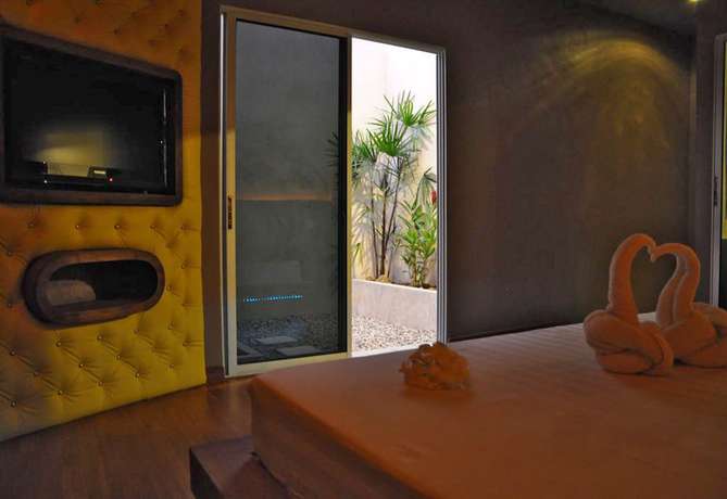 Imagen de la habitación del Hotel In and Out, Nakhon Pathom. Foto 18