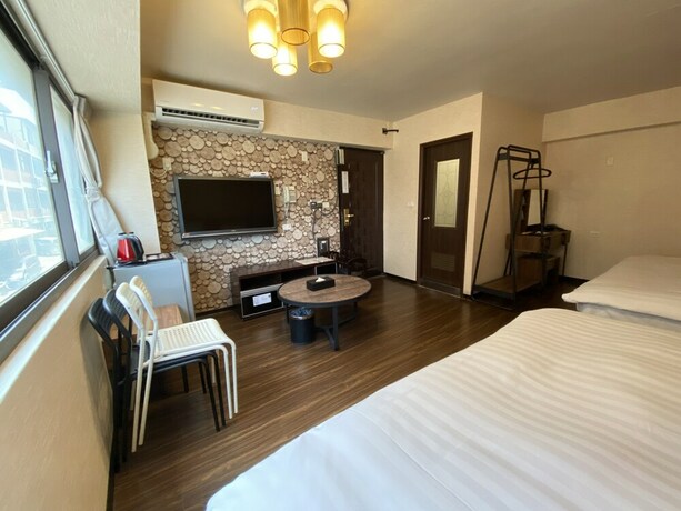 Imagen de la habitación del Hotel In99. Foto 16
