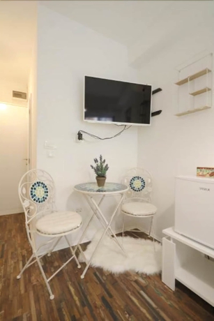 Imagen de la habitación del Hotel Ina Apartments. Foto 13