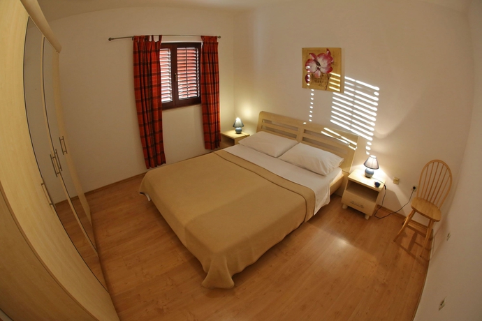 Imagen de la habitación del Hotel Ina Apartments. Foto 18