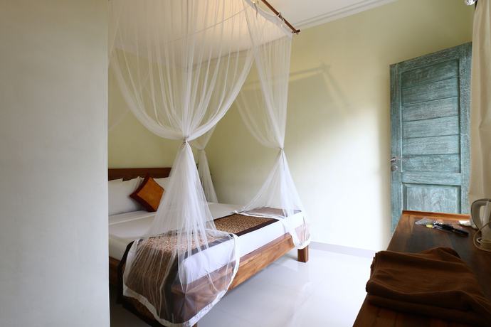 Imagen de la habitación del Hotel Inang Ubud Villa. Foto 11