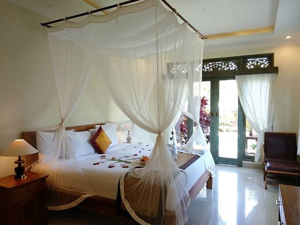 Imagen de la habitación del Hotel Inang Ubud Villa. Foto 16