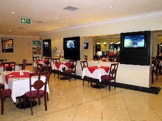 Imagen del bar/restaurante del Hotel Inani Hotel Gallagher. Foto 2