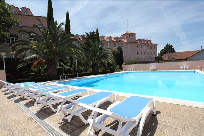 Imagen de la piscina del Hotel Inatel Luso. Foto 17