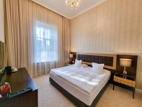 Imagen de la habitación del Hotel Incanto Old Town Boutique. Foto 7