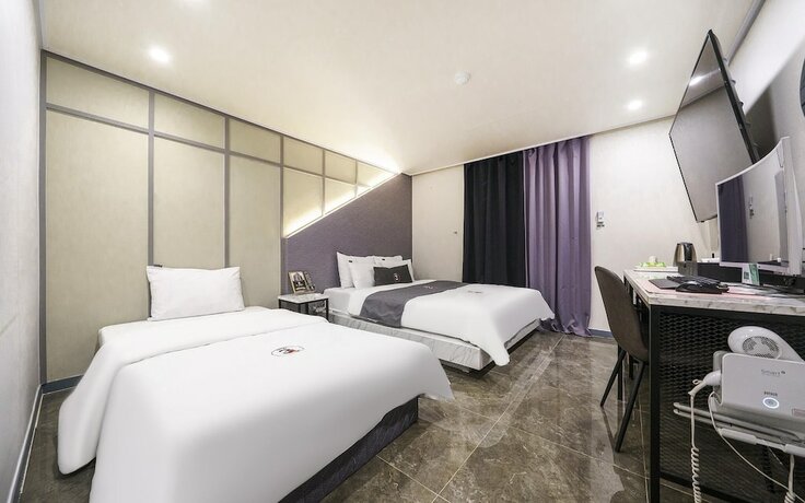Imagen de la habitación del Hotel Incheon 3and4. Foto 12