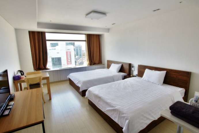 Imagen de la habitación del Hotel Incheon Airport Guesthouse. Foto 8