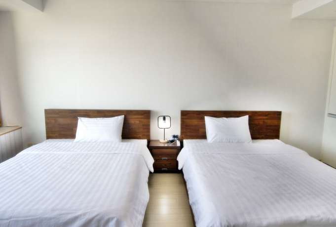 Imagen de la habitación del Hotel Incheon Airport Guesthouse. Foto 13