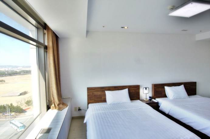 Imagen de la habitación del Hotel Incheon Airport Guesthouse. Foto 15