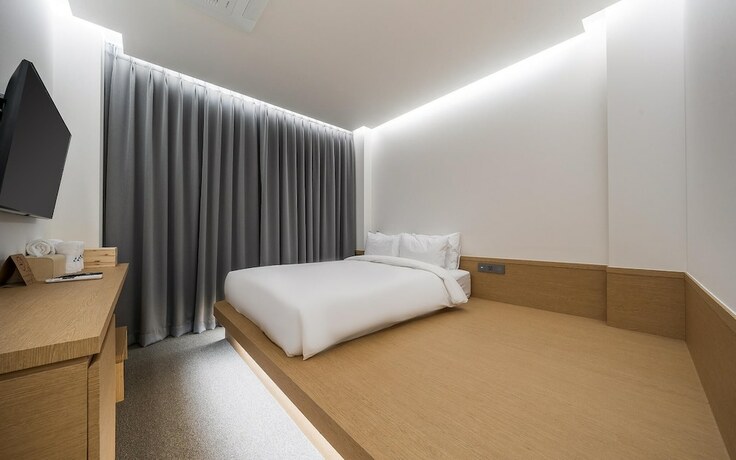 Imagen de la habitación del Hotel Incheon Bluefrog. Foto 16