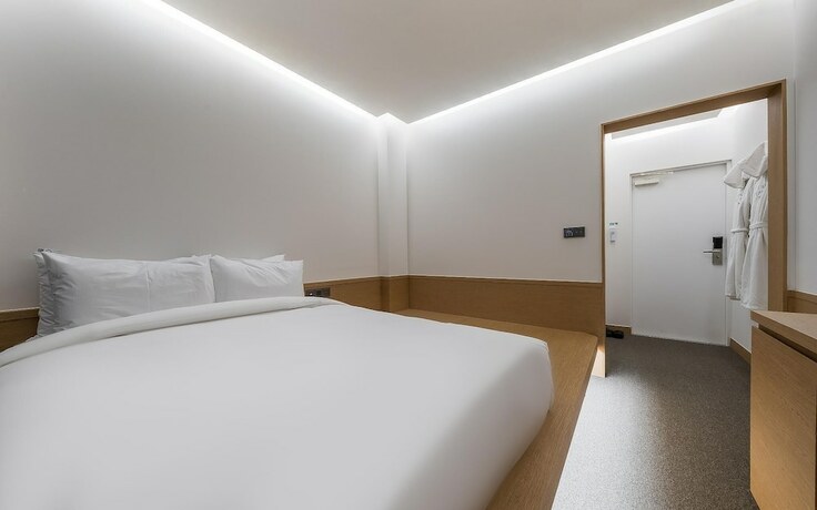 Imagen de la habitación del Hotel Incheon Bluefrog. Foto 17