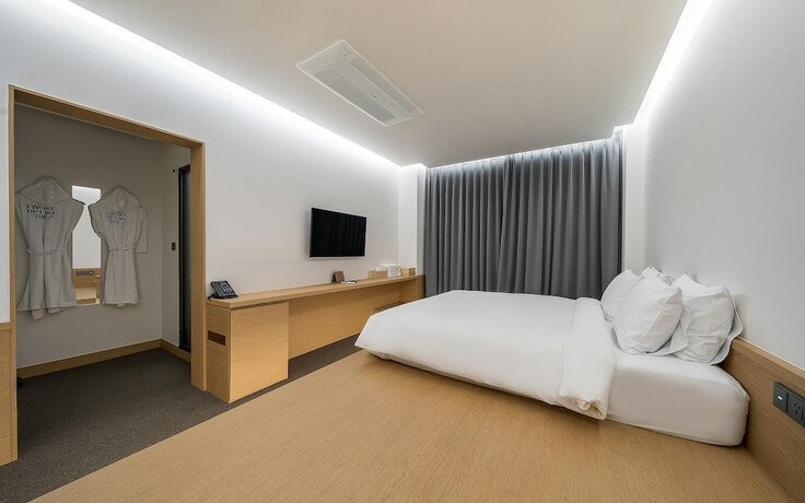 Imagen de la habitación del Hotel Incheon Bluefrog. Foto 19