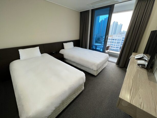 Imagen de la habitación del Hotel Incheon Rivieraverium. Foto 12