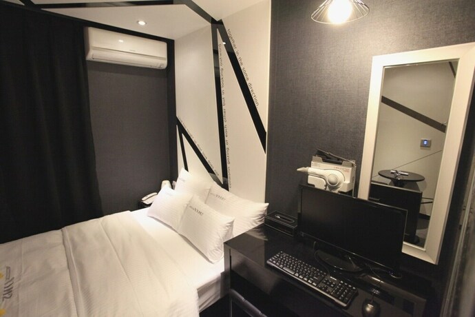 Imagen de la habitación del Hotel Incheon Xym2. Foto 23
