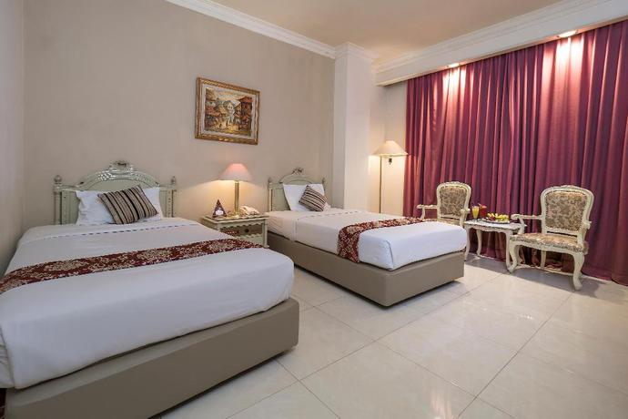 Imagen de la habitación del Hotel Indah Palace. Foto 13