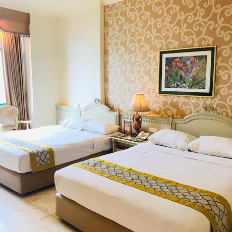 Imagen de la habitación del Hotel Indah Palace. Foto 14