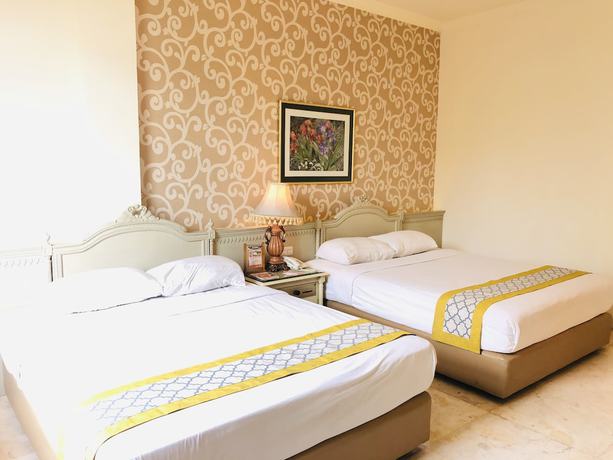 Imagen de la habitación del Hotel Indah Palace Solo. Foto 4