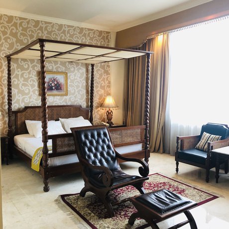 Imagen de la habitación del Hotel Indah Palace Solo. Foto 8