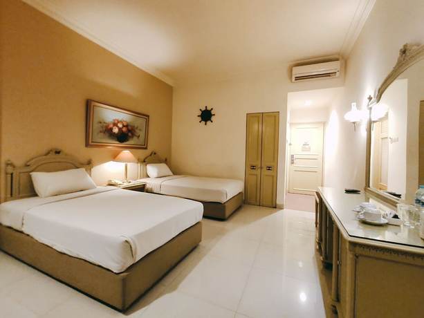 Imagen de la habitación del Hotel Indah Palace Solo. Foto 14