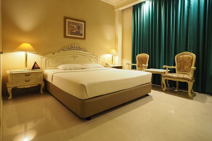 Imagen de la habitación del Hotel Indah Palace Solo. Foto 17