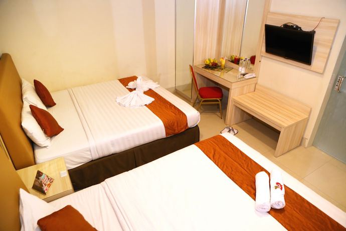 Imagen de la habitación del Hotel Indah Palace Tawangmangu. Foto 9