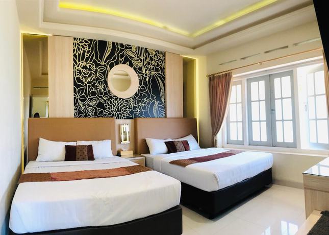 Imagen de la habitación del Hotel Indah Palace Tawangmangu. Foto 10