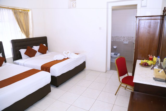Imagen de la habitación del Hotel Indah Palace Tawangmangu. Foto 14