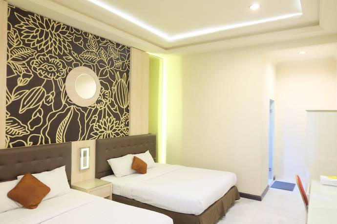 Imagen de la habitación del Hotel Indah Palace Tawangmangu. Foto 18