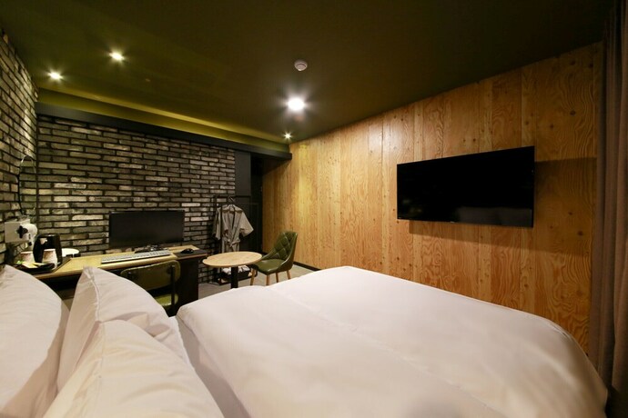 Imagen de la habitación del Hotel Indeokwon Wol. Foto 33