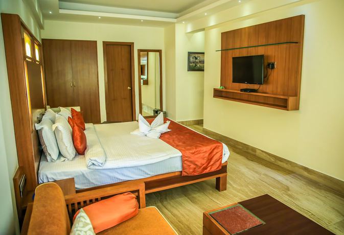 Imagen de la habitación del Hotel Inderlok, Dehradun. Foto 5