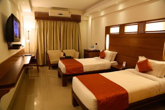 Imagen de la habitación del Hotel Inderlok, Dehradun. Foto 7