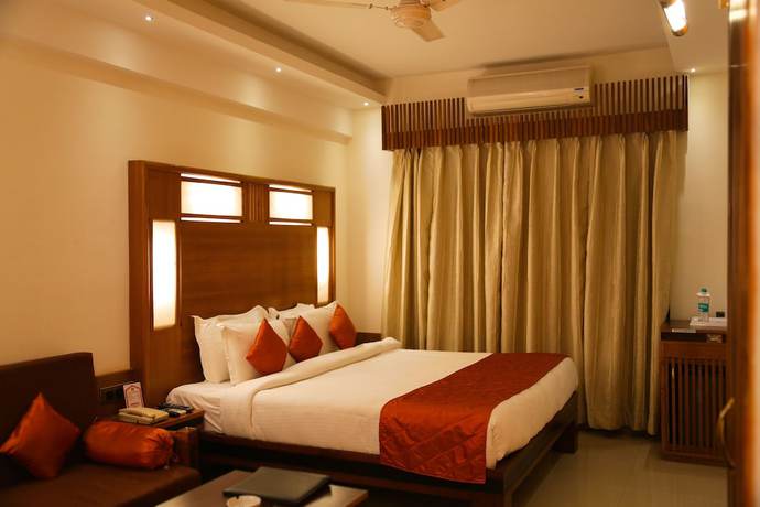 Imagen de la habitación del Hotel Inderlok, Dehradun. Foto 8