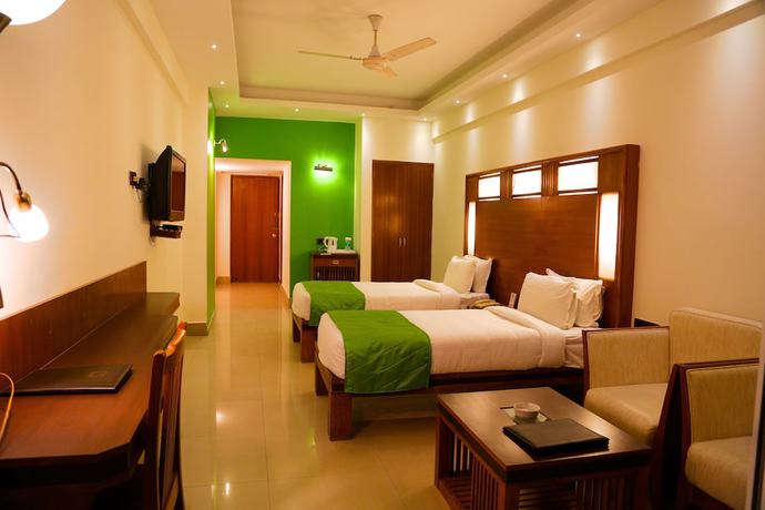 Imagen de la habitación del Hotel Inderlok, Dehradun. Foto 9