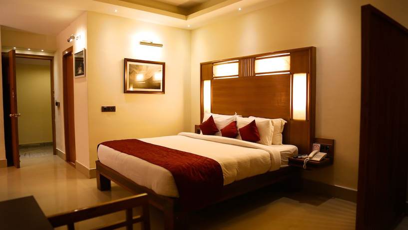 Imagen de la habitación del Hotel Inderlok, Dehradun. Foto 12