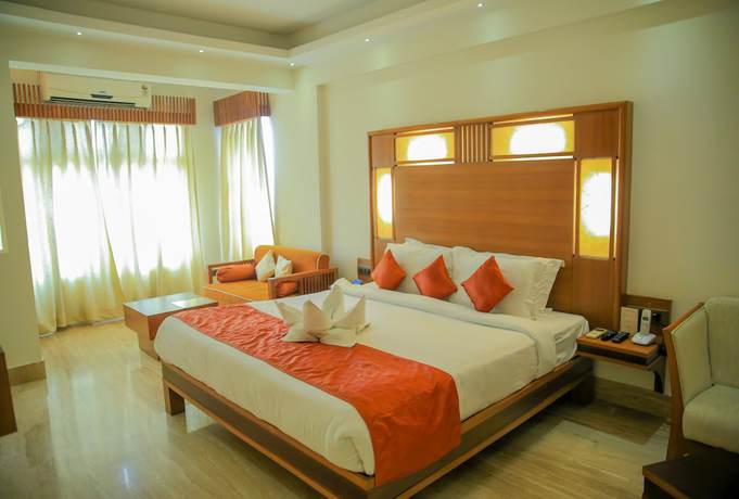Imagen de la habitación del Hotel Inderlok, Dehradun. Foto 15