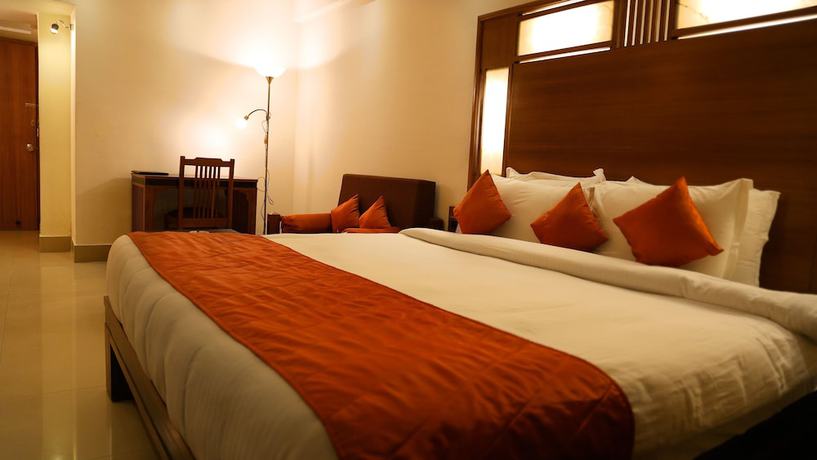Imagen de la habitación del Hotel Inderlok, Dehradun. Foto 16