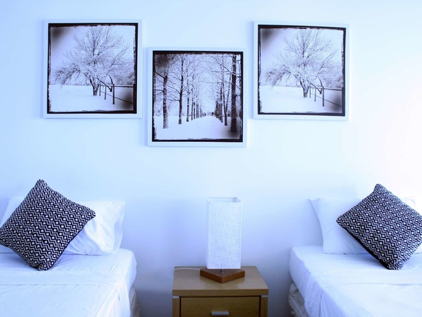 Imagen de la habitación del Hotel Indigo Blue Beachfront Apartments. Foto 7