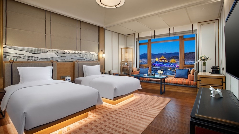 Imagen de la habitación del Hotel Indigo Diqing Moonlight City. Foto 12