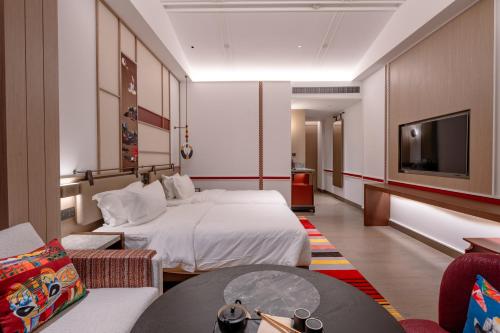 Imagen de la habitación del Hotel Indigo Lugu Lake, an IHG. Foto 11