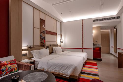 Imagen de la habitación del Hotel Indigo Lugu Lake, an IHG. Foto 13
