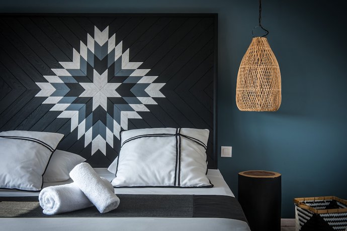 Imagen de la habitación del Hotel Indigo Suites Collection Adults Only. Foto 6