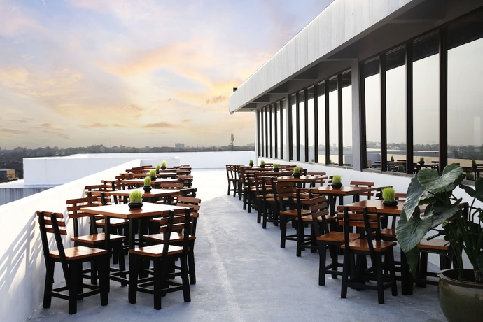 Imagen del bar/restaurante del Hotel Indoluxe Rent Apartment Jogja. Foto 3
