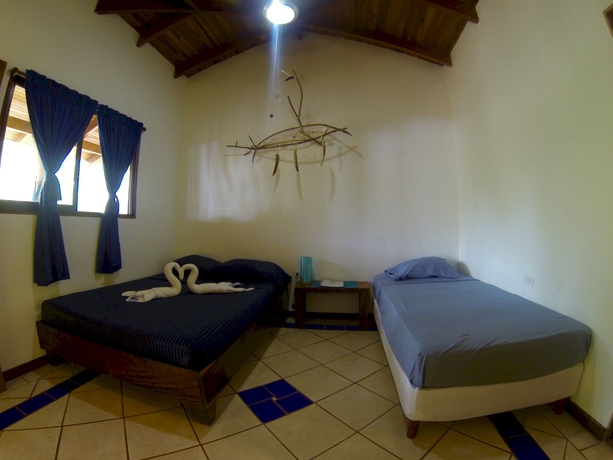 Imagen de la habitación del Hotel Indra Inn. Foto 7